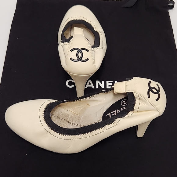 CHANEL Shoes - CHANEL Cream and Black CC Logo Kitten Heel Pumps